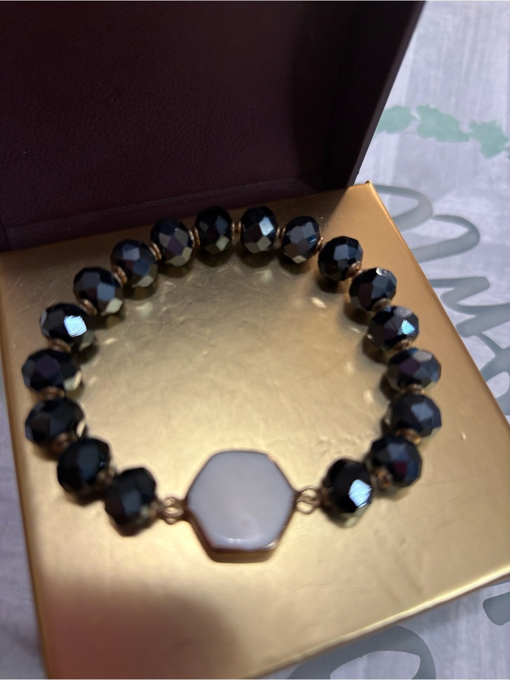 Faceted Black Bead Bracelet with White Hexagon Accent
